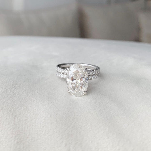 2 CT Oval Cut Lab Grown Diamond Engagement Ring Bridal Set with a dazzling pave setting. The perfect Anniversary Day gift set for her.