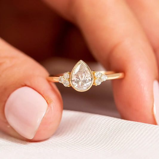 Pear Cut Accent Engagement Ring