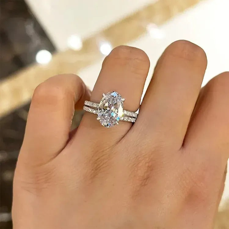 2 CT Oval Cut Lab Grown Diamond Engagement Ring Bridal Set with a dazzling pave setting. The perfect Anniversary Day gift set for her.