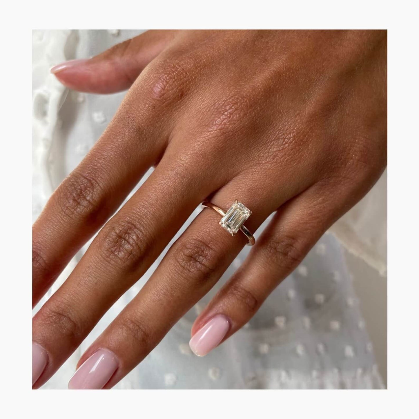 Sophisticated Elegance Hidden Halo Ring with Emerald Cut CVD Diamond
