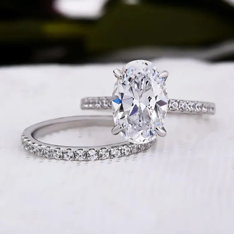 2 CT Oval Cut Lab Grown Diamond Engagement Ring Bridal Set with a dazzling pave setting. The perfect Anniversary Day gift set for her.
