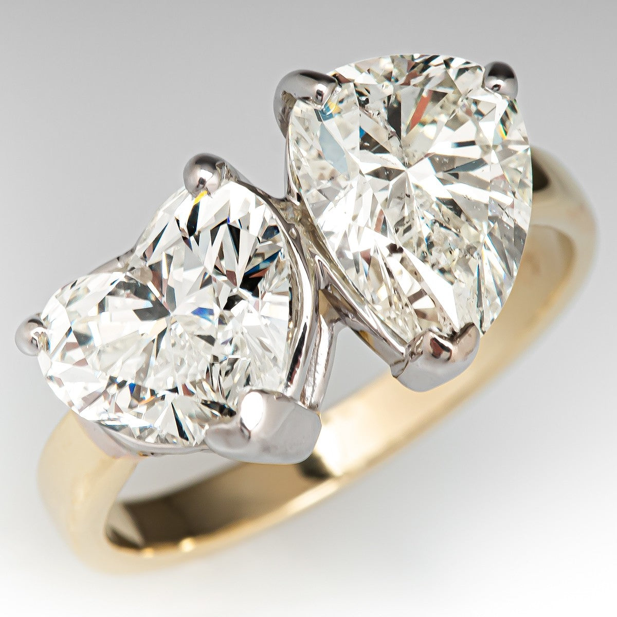 4.0 CT Pear and Heart Cut Lab Grown Diamond Engagement Ring. A vintage-inspired 'Toi et Moi two-stone ring, symbolizing love and unity.