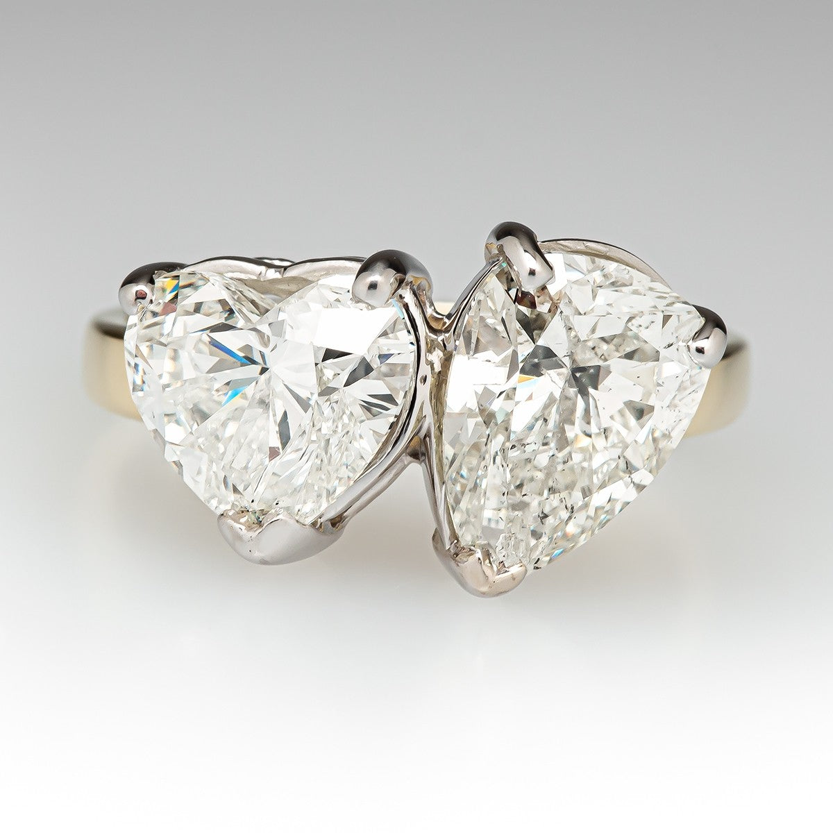 4.0 CT Pear and Heart Cut Lab Grown Diamond Engagement Ring. A vintage-inspired 'Toi et Moi two-stone ring, symbolizing love and unity.