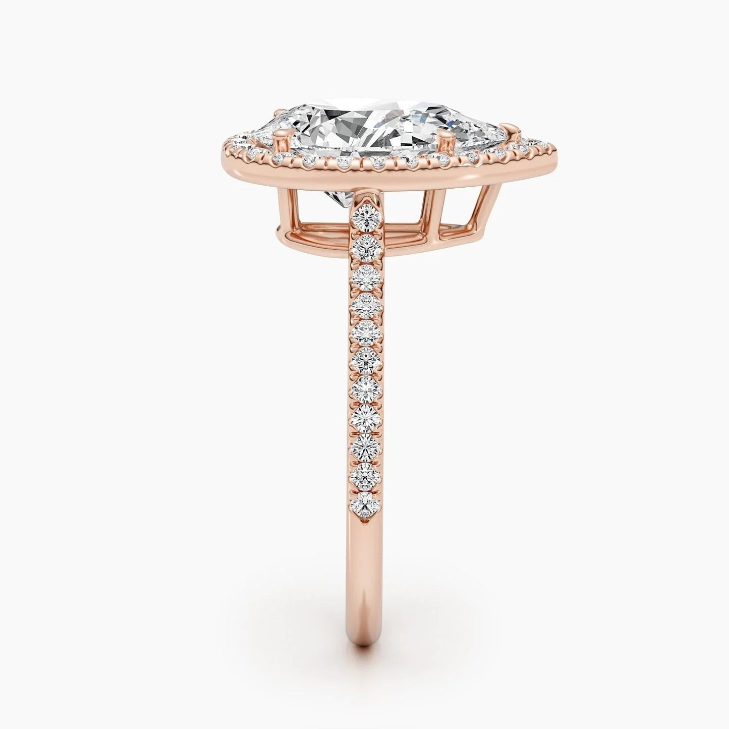 3 CT Pear Cut Lab Grown Diamond Engagement Ring with a sparkling halo and pave setting. The perfect Valentine's Day gift for her.