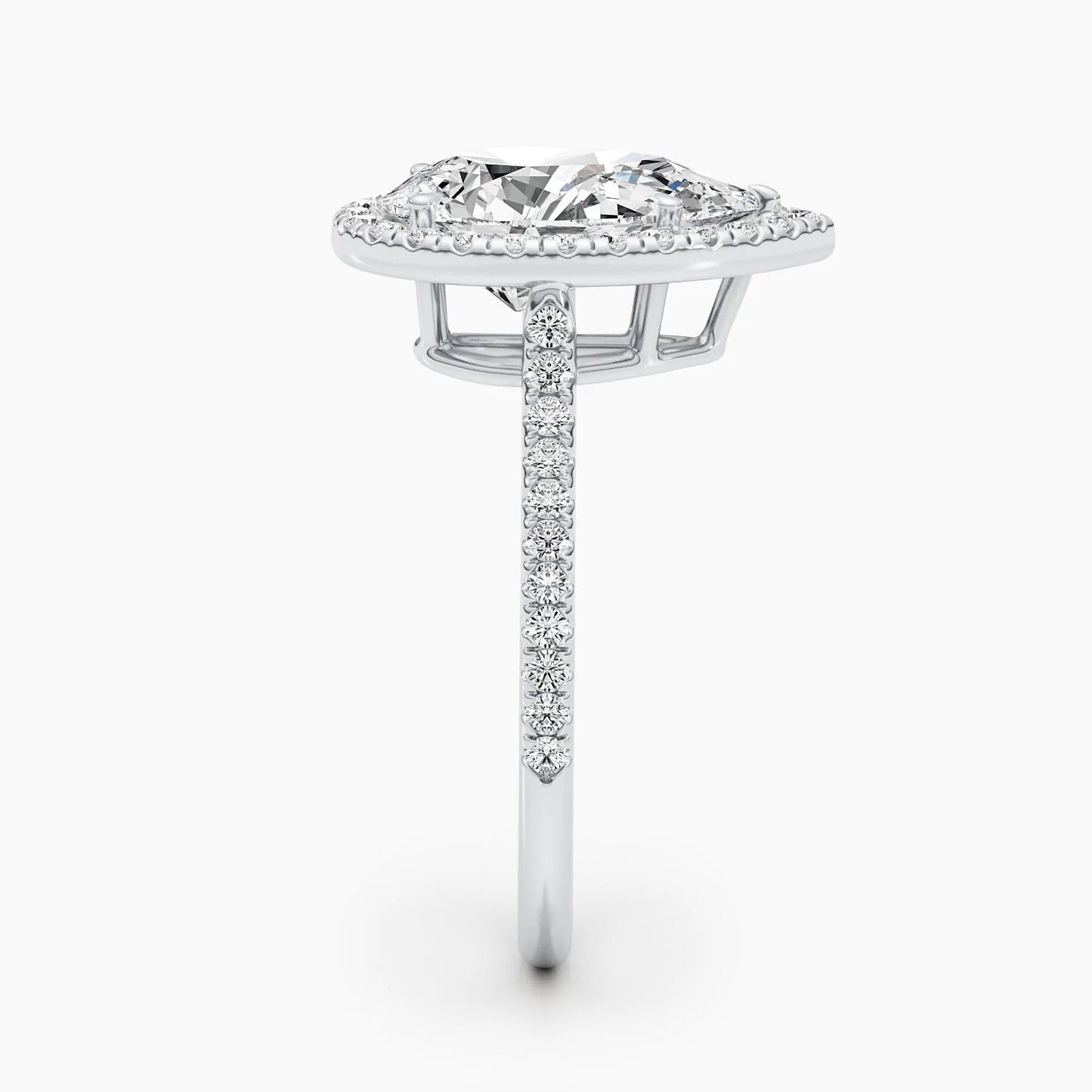 3 CT Pear Cut Lab Grown Diamond Engagement Ring with a sparkling halo and pave setting. The perfect Valentine's Day gift for her.