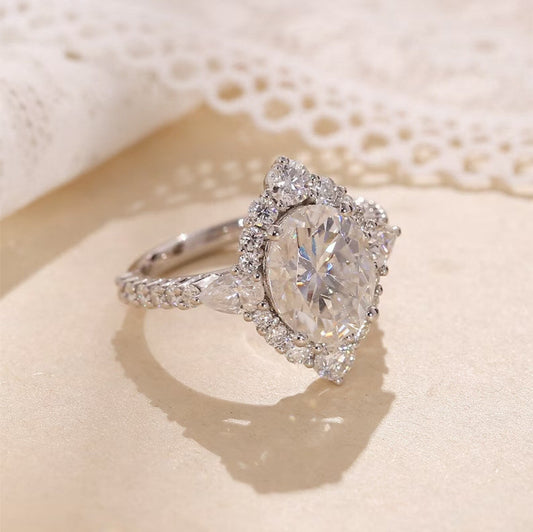 3 CT Oval Cut Lab Grown Diamond Engagement Ring Bridal Set with a dazzling pave setting. The perfect Anniversary Day gift set for her.